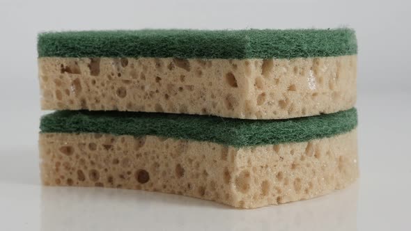 Pair of fiber sponges close-up 4K tilting video