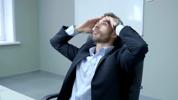 Shot of Stressed Business Man in the Office