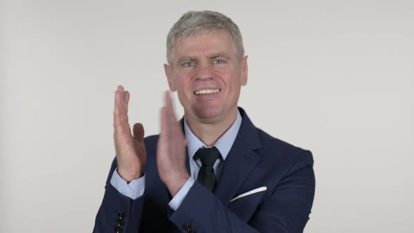 Clapping Senior Businessman Applauding on White Background