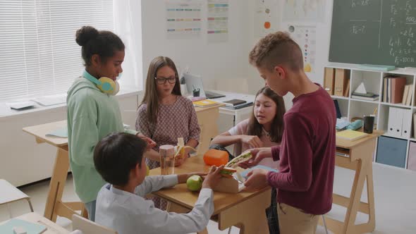 Group of Children Eating Lunch on Break