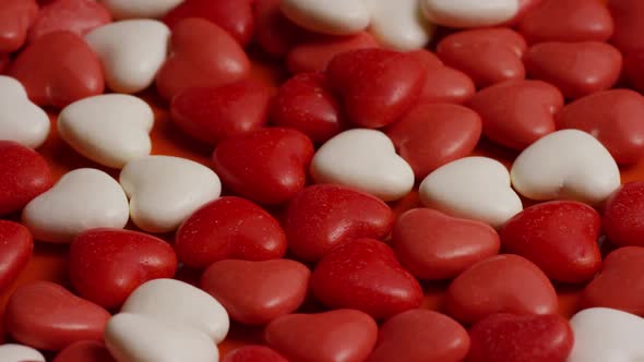 Rotating stock footage shot of Valentines decorations and candies - VALENTINES 0063