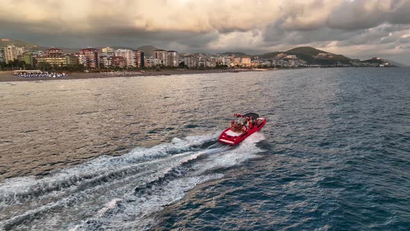 Sports boat sails fast on the sea aerial view 4 K