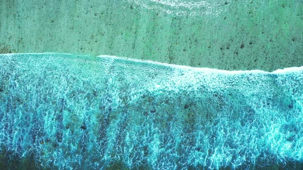 Aerial drone shot tourism of tropical coastline beach time by aqua blue ocean and white sandy backgr