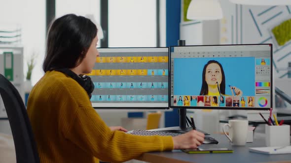 Photo Editor Working on Computer Retouching Photo