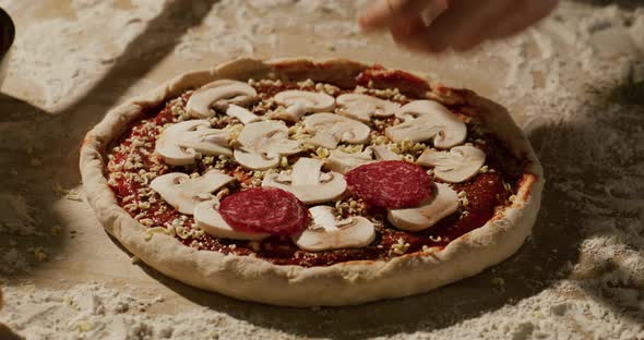 Homemade Pizza with Mushrooms Tomato Sauce Meat Spices and Cheese