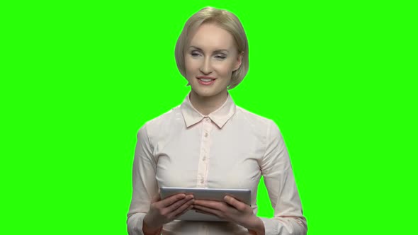 Portrait of Beautiful Woman Using Tablet Device