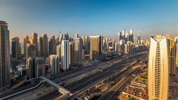 Beautiful Aerial Top View at Sunset Timelapse of Dubai Marina and JLT in Dubai UAE