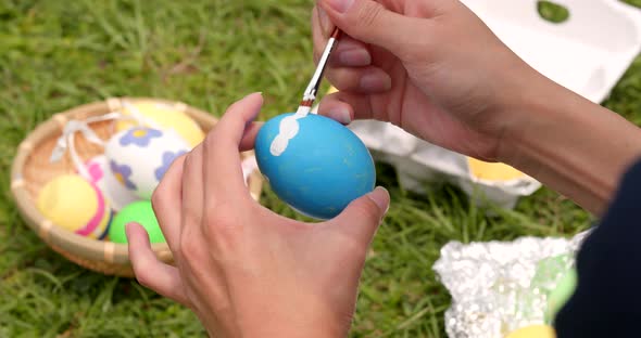 Colorful Easter holiday egg at outdoor