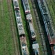 Aerial Tilt Shot of an Abandoned Rusty Locomotives and Old Railways - VideoHive Item for Sale