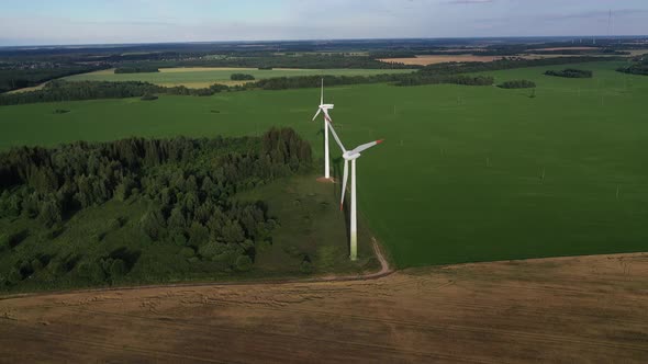 Windmills in Summer in a Green Field