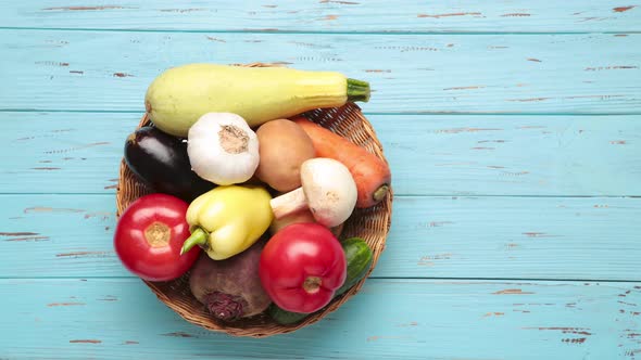 Organic and fresh fruits and vegetables appear and disappear from basket