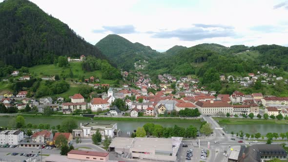 Medieval city beside river with castle and one of the largest breweries in Europe. Aerial 4k View.