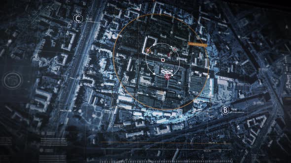 Monitor Shows Feed Of Drone In Aerial Pursuit Of Target Car On Streets alt