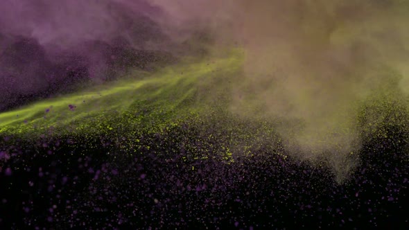 Purple and yellow powder colliding in the air, Slow Motion alt