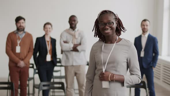 African Office Worker Posing and Smiling