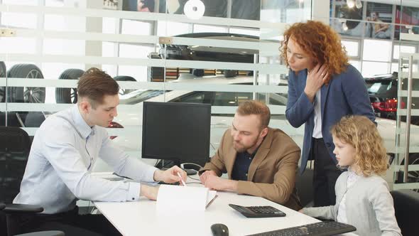 Consultant and Customers in Dealership