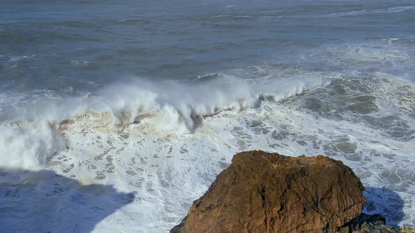 Wave Crashing on a Coast in Nazare