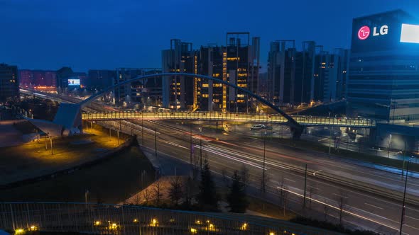 View of modern city illuminated at night with traffic, Milan, timelapse, 4k