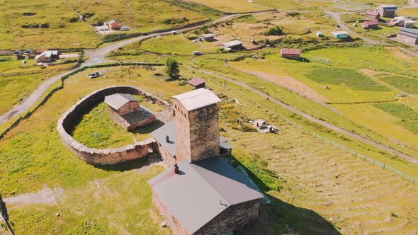 Cinematic Aerial View Of Old Monastery Building In Ushguli