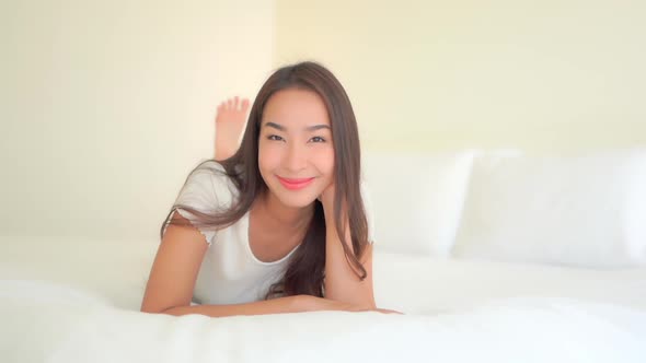 Asian woman enjoy around beautiful beach sea ocean