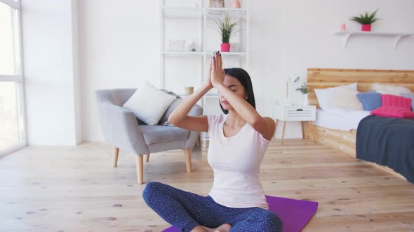 Young Adult Female Doing Yoga at Home Slow Motion