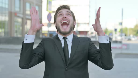 Portrait of Angry Businessman Shouting and Screaming Outdoor