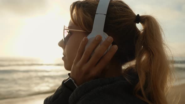 Listening To Music On The Beach
