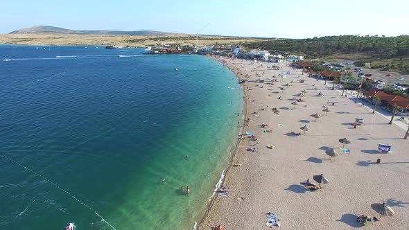 Aerial view of famous zrce party beach of Pag island in the morning, Croatia