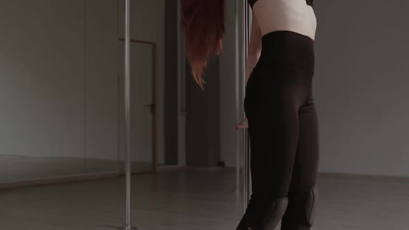 Fit Woman Dancing Erotic Dance in Studio