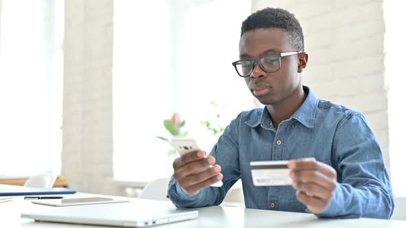 Successful Online Payment on Phone By Young African Man