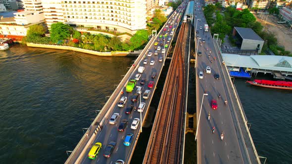 4K UHD : Aerial view over the Chao Phraya River and Buildings of Bangkok