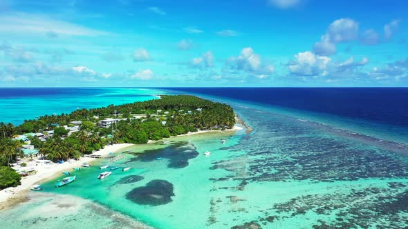 Aerial drone shot nature of paradise tourist beach adventure by clear lagoon and white sand backgrou