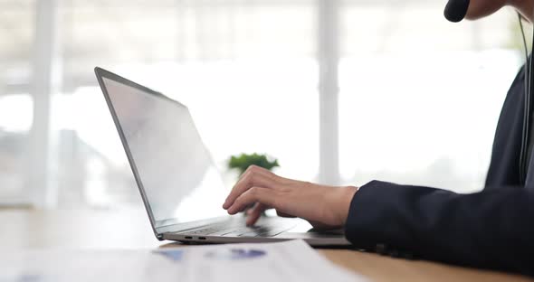 Hands typing on keyboard laptop / Videohive