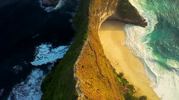 Descending the Stairs To the Most Popular Spot in Nusa Penida Island, Kelingking Beach, Bali. Manta