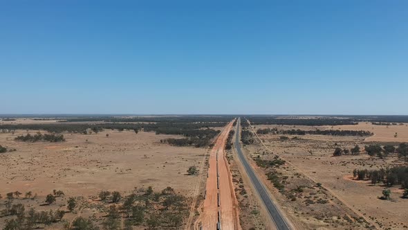 In the desert a huge water pipeline is being built to bring water to a remote city