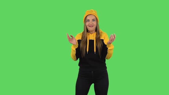 Modern Girl in Yellow Hat Is Clapping Her Hands with Wow Happy Joy and Delight. Green Screen