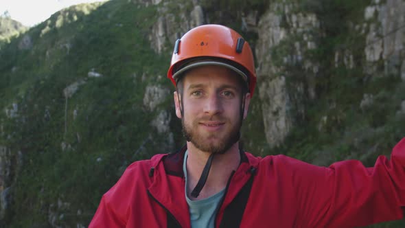 Young Caucasian man smiling in helmet