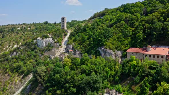 Aerial view of mountain monastery. Antique and heritage stronghold fortification on rock