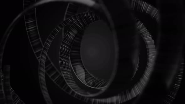 Animation of rotating, monochrome interwoven spirals on black background