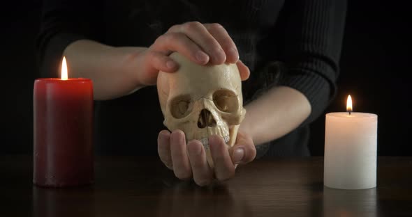 Fortune Teller with a Skull in Her Hands