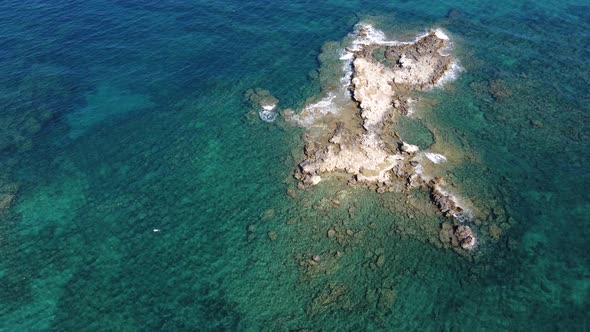 Aerial Video View From Drone on Underwater Reefs and Coastal Rocks in Mediterranean Sea Near Beaches