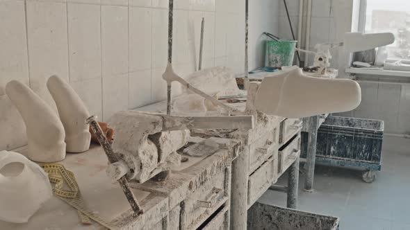 Tools And Plaster Casts In Workshop