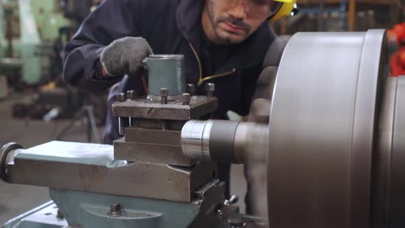 Smart Factory Worker Using Machine in Factory Workshop