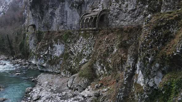 Abandoned Old Dangerous Road in a Narrow Gorge Along the Mzymta River