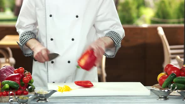 Chef Cutting Red Paprika.