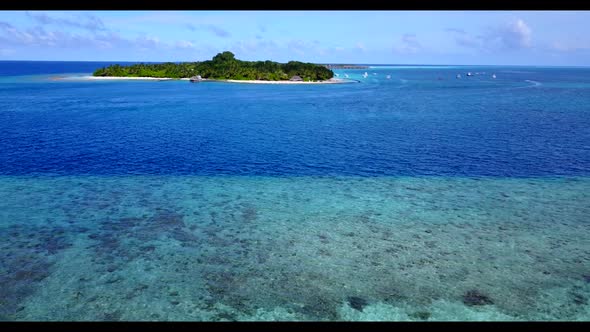Aerial flying over scenery of paradise coastline beach journey by clear water with white sandy backg