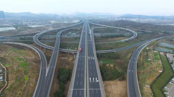 Aerial view of highway and overpass in city