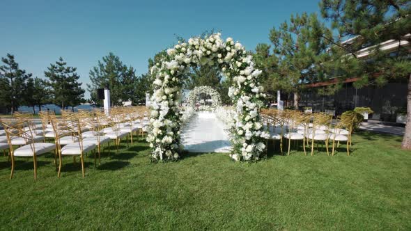 Luxury Wedding Arch in White Flowers