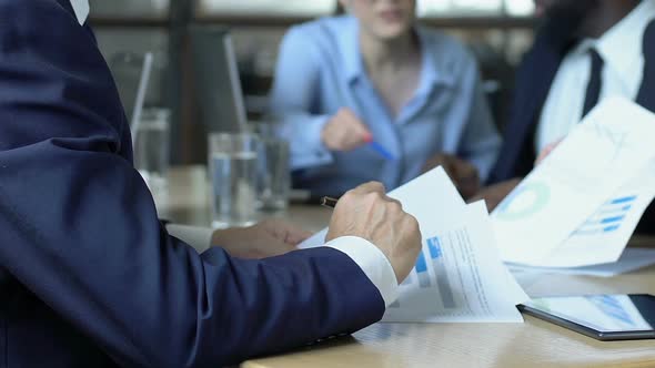 Workers Arguing About Missed Deadline, Boss Slamming Hand on Table Stop Quarrel