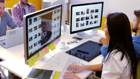 Graphic designers working at their desk